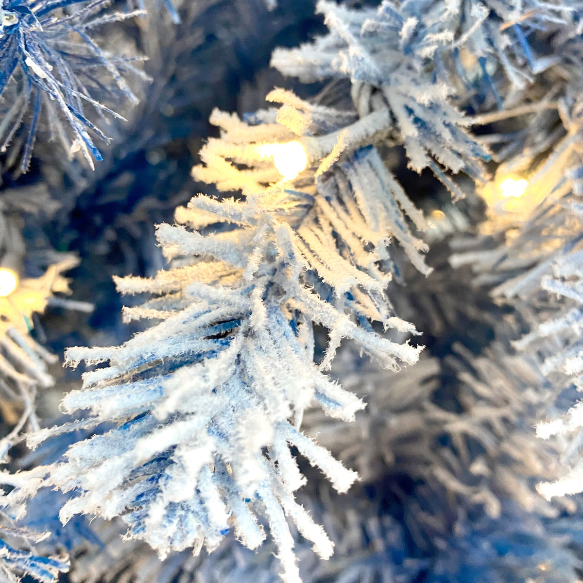 6-Foot Blue Snow-Flocked Pre-Lit Christmas Tree – 750 Tips
